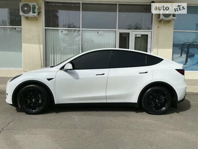 Білий Тесла Model Y, об'ємом двигуна 0 л та пробігом 23 тис. км за 38500 $, фото 2 на Automoto.ua