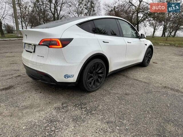 Білий Тесла Model Y, об'ємом двигуна 0 л та пробігом 127 тис. км за 22999 $, фото 4 на Automoto.ua