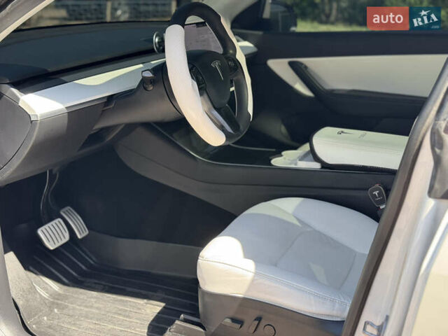 Белый Тесла Model Y, объемом двигателя 0 л и пробегом 84 тыс. км за 28000 $, фото 13 на Automoto.ua