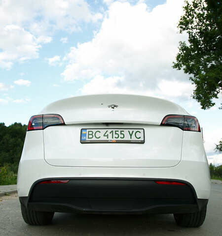 Білий Тесла Model Y, об'ємом двигуна 0 л та пробігом 63 тис. км за 24700 $, фото 1 на Automoto.ua