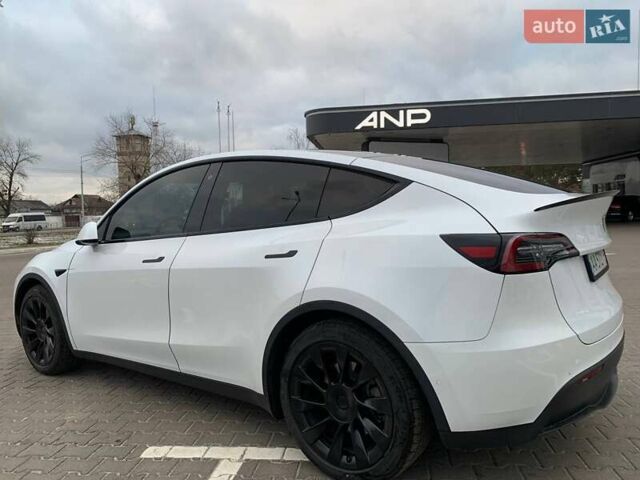 Белый Тесла Model Y, объемом двигателя 0 л и пробегом 90 тыс. км за 22000 $, фото 2 на Automoto.ua