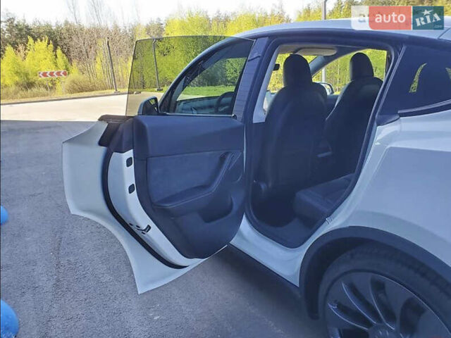 Белый Тесла Model Y, объемом двигателя 0 л и пробегом 9 тыс. км за 33333 $, фото 29 на Automoto.ua