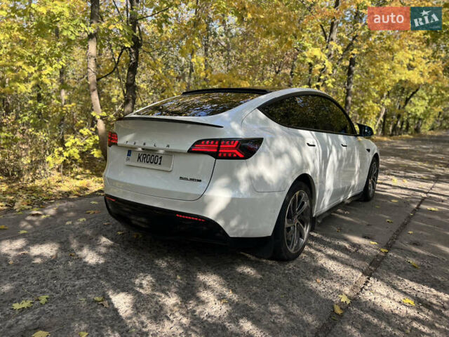 Білий Тесла Model Y, об'ємом двигуна 0 л та пробігом 126 тис. км за 28800 $, фото 13 на Automoto.ua