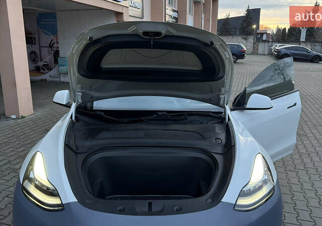 Білий Тесла Model Y, об'ємом двигуна 0 л та пробігом 187 тис. км за 18900 $, фото 37 на Automoto.ua