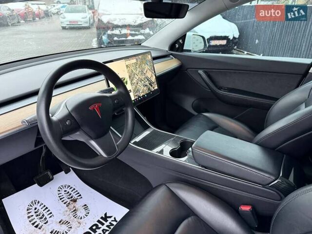 Белый Тесла Model Y, объемом двигателя 0 л и пробегом 142 тыс. км за 18800 $, фото 11 на Automoto.ua