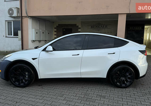 Білий Тесла Model Y, об'ємом двигуна 0 л та пробігом 187 тис. км за 18900 $, фото 9 на Automoto.ua