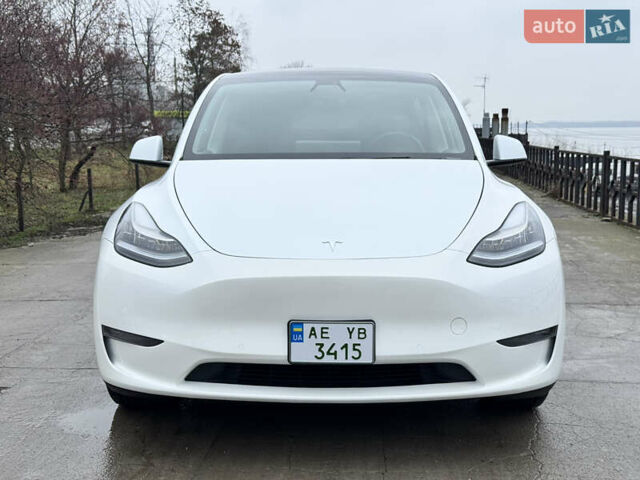 Белый Тесла Model Y, объемом двигателя 0 л и пробегом 77 тыс. км за 25000 $, фото 1 на Automoto.ua