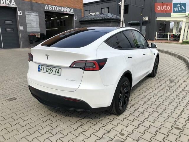 Белый Тесла Model Y, объемом двигателя 0 л и пробегом 51 тыс. км за 26000 $, фото 3 на Automoto.ua