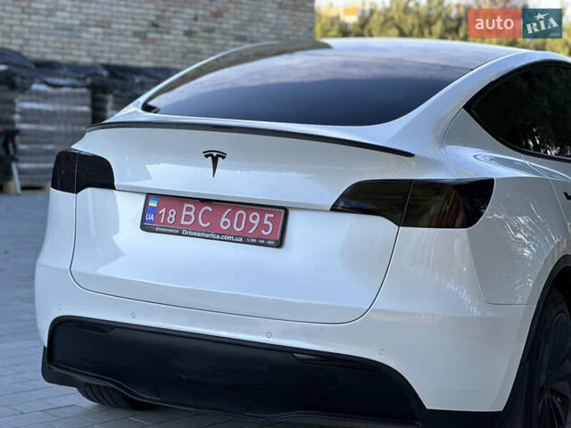 Белый Тесла Model Y, объемом двигателя 0 л и пробегом 118 тыс. км за 21700 $, фото 24 на Automoto.ua