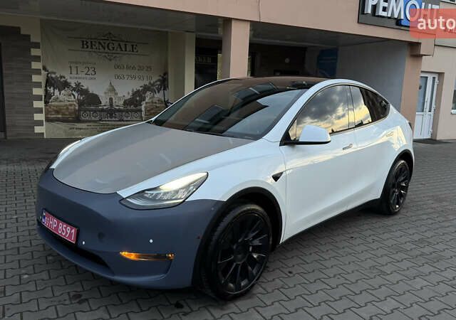 Білий Тесла Model Y, об'ємом двигуна 0 л та пробігом 187 тис. км за 18900 $, фото 1 на Automoto.ua