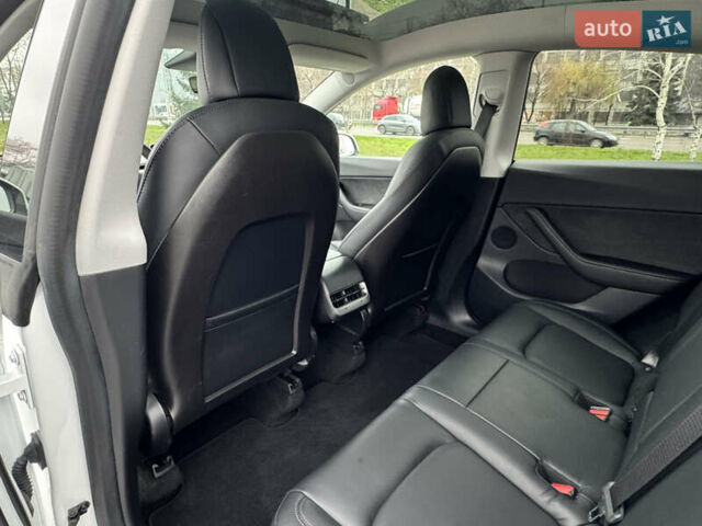 Белый Тесла Model Y, объемом двигателя 0 л и пробегом 77 тыс. км за 25000 $, фото 24 на Automoto.ua