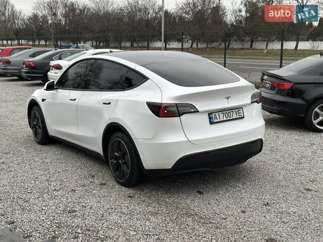 Білий Тесла Model Y, об'ємом двигуна 0 л та пробігом 66 тис. км за 19500 $, фото 15 на Automoto.ua