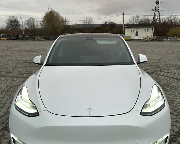 Белый Тесла Model Y, объемом двигателя 0 л и пробегом 85 тыс. км за 22000 $, фото 1 на Automoto.ua