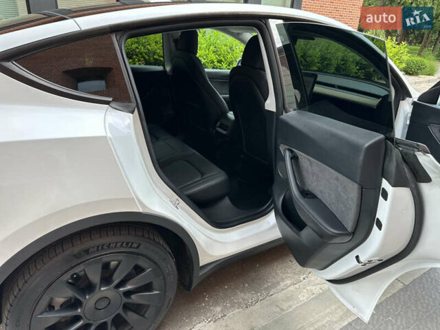 Белый Тесла Model Y, объемом двигателя 0 л и пробегом 53 тыс. км за 23500 $, фото 46 на Automoto.ua