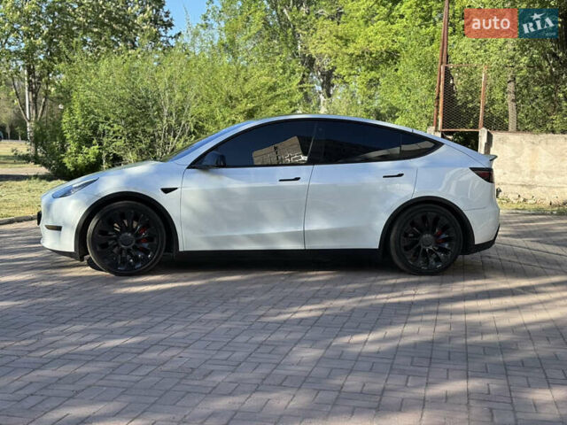Белый Тесла Model Y, объемом двигателя 0 л и пробегом 84 тыс. км за 28000 $, фото 6 на Automoto.ua