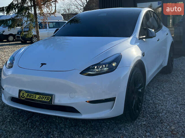 Белый Тесла Model Y, объемом двигателя 0 л и пробегом 73 тыс. км за 24800 $, фото 2 на Automoto.ua