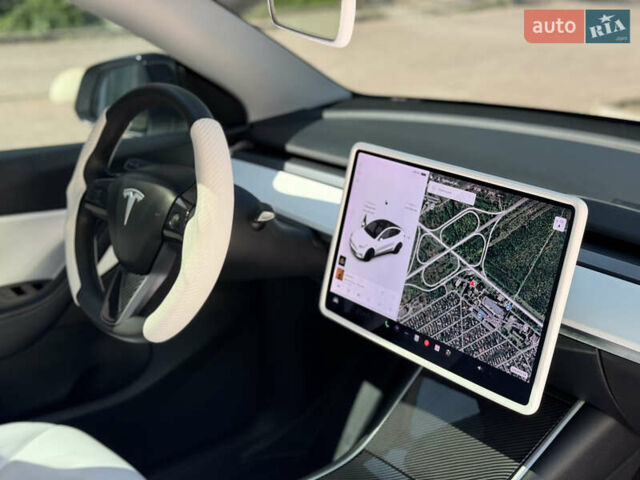Белый Тесла Model Y, объемом двигателя 0 л и пробегом 84 тыс. км за 28000 $, фото 23 на Automoto.ua