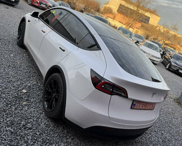Білий Тесла Model Y, об'ємом двигуна 0 л та пробігом 100 тис. км за 21499 $, фото 12 на Automoto.ua