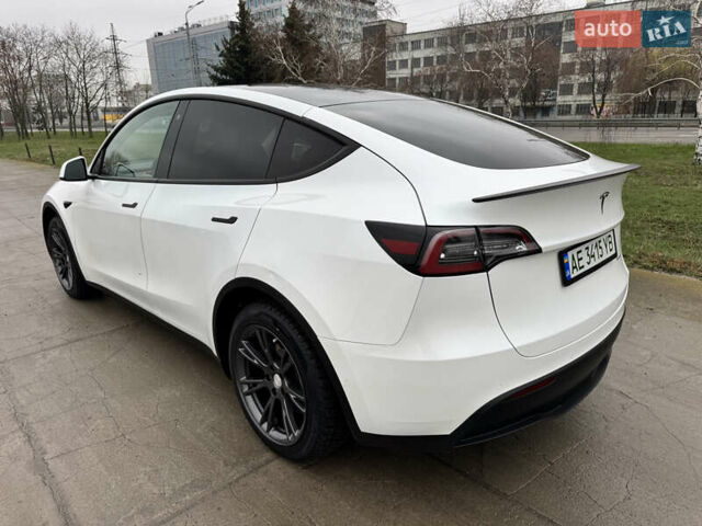 Белый Тесла Model Y, объемом двигателя 0 л и пробегом 77 тыс. км за 25000 $, фото 36 на Automoto.ua