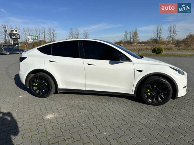 Белый Тесла Model Y, объемом двигателя 0 л и пробегом 85 тыс. км за 22900 $, фото 4 на Automoto.ua