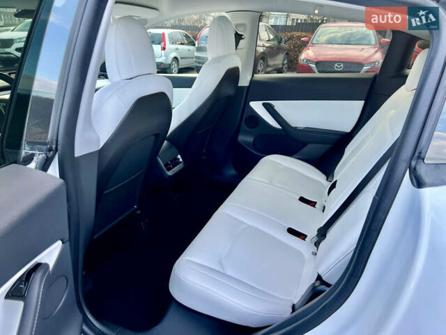 Белый Тесла Model Y, объемом двигателя 0 л и пробегом 57 тыс. км за 28500 $, фото 28 на Automoto.ua