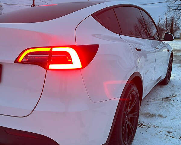 Белый Тесла Model Y, объемом двигателя 0 л и пробегом 97 тыс. км за 24900 $, фото 4 на Automoto.ua