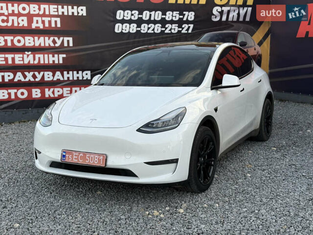 Білий Тесла Model Y, об'ємом двигуна 0 л та пробігом 100 тис. км за 21499 $, фото 2 на Automoto.ua
