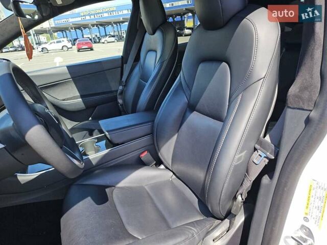 Белый Тесла Model Y, объемом двигателя 0 л и пробегом 110 тыс. км за 20499 $, фото 9 на Automoto.ua