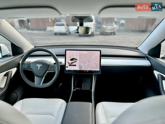 Белый Тесла Model Y, объемом двигателя 0 л и пробегом 57 тыс. км за 28500 $, фото 29 на Automoto.ua