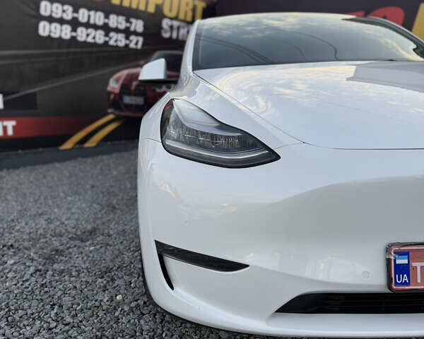 Білий Тесла Model Y, об'ємом двигуна 0 л та пробігом 100 тис. км за 21499 $, фото 29 на Automoto.ua