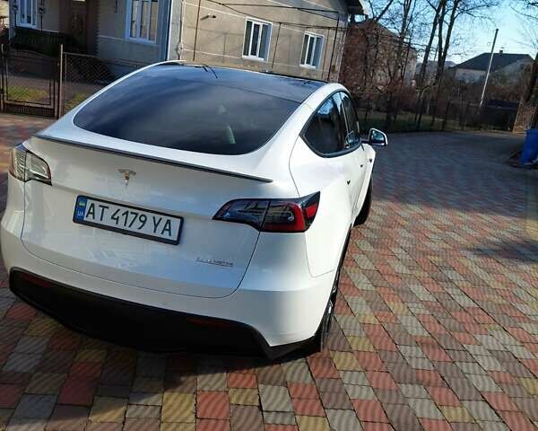 Белый Тесла Model Y, объемом двигателя 0 л и пробегом 113 тыс. км за 24700 $, фото 44 на Automoto.ua