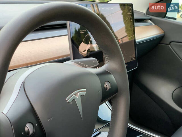 Белый Тесла Model Y, объемом двигателя 0 л и пробегом 35 тыс. км за 26500 $, фото 26 на Automoto.ua