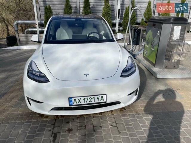 Белый Тесла Model Y, объемом двигателя 0 л и пробегом 65 тыс. км за 32000 $, фото 1 на Automoto.ua