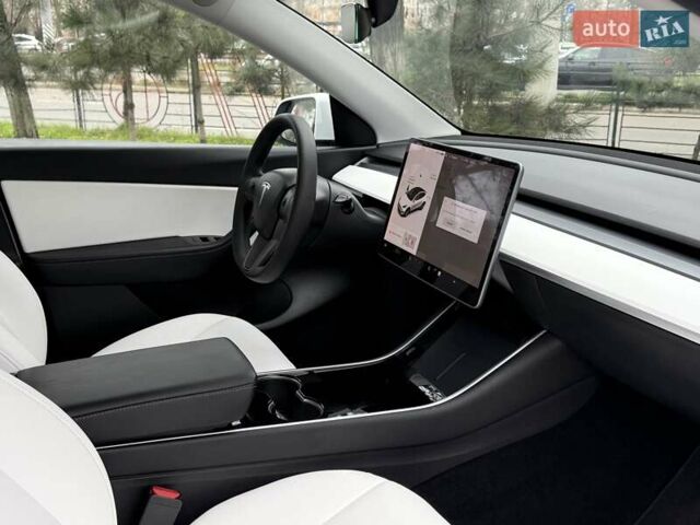 Білий Тесла Model Y, об'ємом двигуна 0 л та пробігом 111 тис. км за 23599 $, фото 10 на Automoto.ua