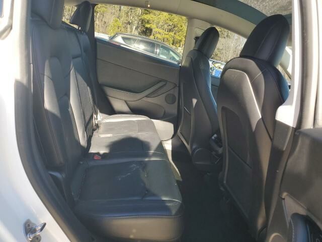 Белый Тесла Model Y, объемом двигателя 0 л и пробегом 131 тыс. км за 18300 $, фото 9 на Automoto.ua