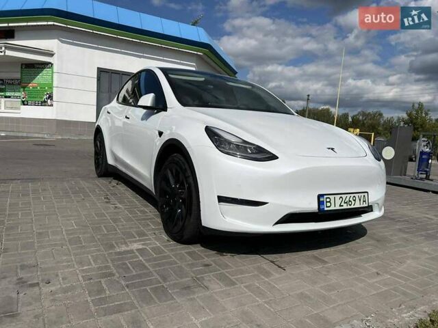 Білий Тесла Model Y, об'ємом двигуна 0 л та пробігом 100 тис. км за 22500 $, фото 1 на Automoto.ua