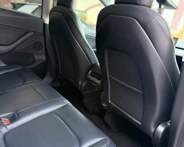 Білий Тесла Model Y, об'ємом двигуна 0 л та пробігом 100 тис. км за 21499 $, фото 24 на Automoto.ua