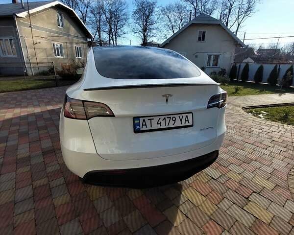 Белый Тесла Model Y, объемом двигателя 0 л и пробегом 113 тыс. км за 24700 $, фото 25 на Automoto.ua