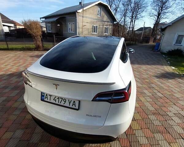 Белый Тесла Model Y, объемом двигателя 0 л и пробегом 113 тыс. км за 24700 $, фото 26 на Automoto.ua