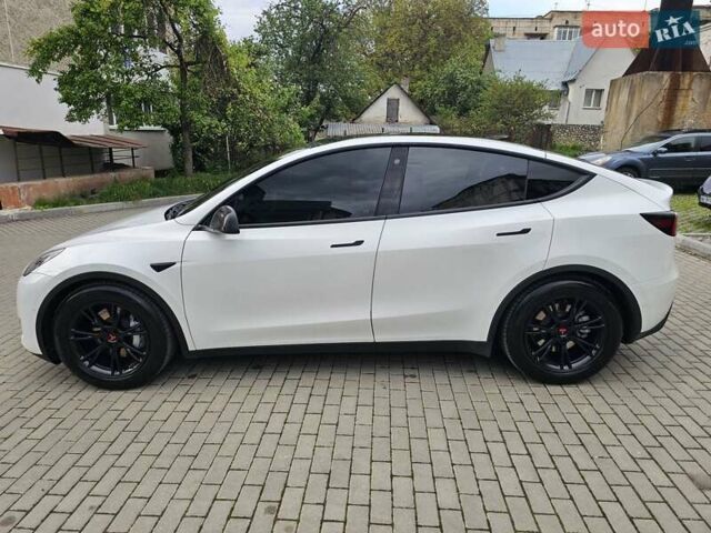 Белый Тесла Model Y, объемом двигателя 0 л и пробегом 74 тыс. км за 23000 $, фото 4 на Automoto.ua