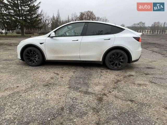 Білий Тесла Model Y, об'ємом двигуна 0 л та пробігом 127 тис. км за 22999 $, фото 7 на Automoto.ua