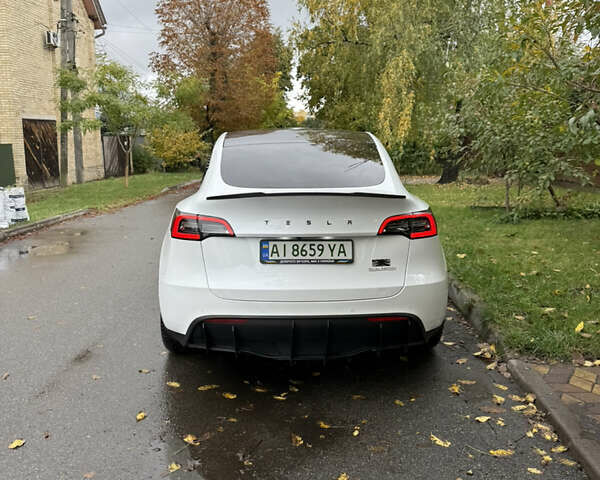 Белый Тесла Model Y, объемом двигателя 0 л и пробегом 62 тыс. км за 28500 $, фото 4 на Automoto.ua