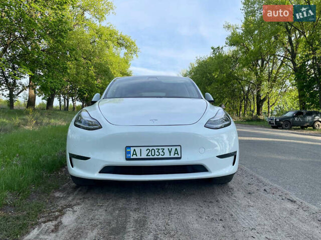 Білий Тесла Model Y, об'ємом двигуна 0 л та пробігом 80 тис. км за 32000 $, фото 13 на Automoto.ua