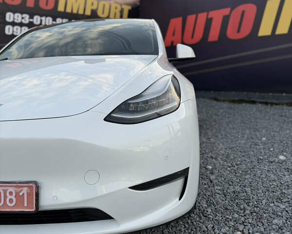 Білий Тесла Model Y, об'ємом двигуна 0 л та пробігом 100 тис. км за 21499 $, фото 30 на Automoto.ua