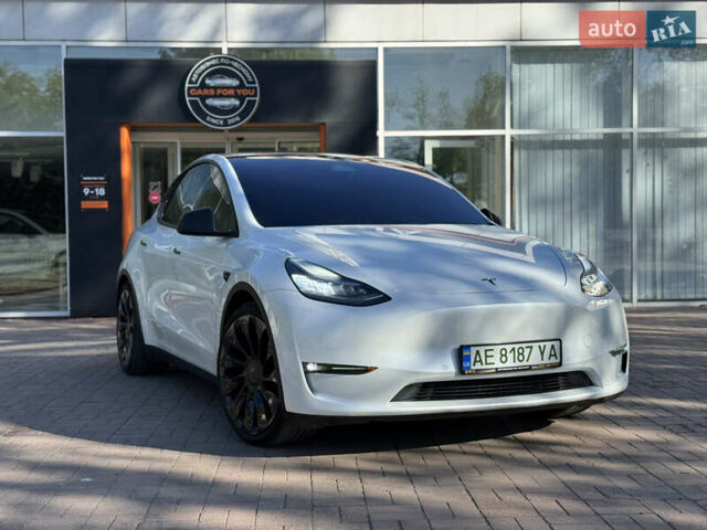 Белый Тесла Model Y, объемом двигателя 0 л и пробегом 84 тыс. км за 28000 $, фото 1 на Automoto.ua