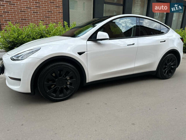 Белый Тесла Model Y, объемом двигателя 0 л и пробегом 53 тыс. км за 23500 $, фото 7 на Automoto.ua