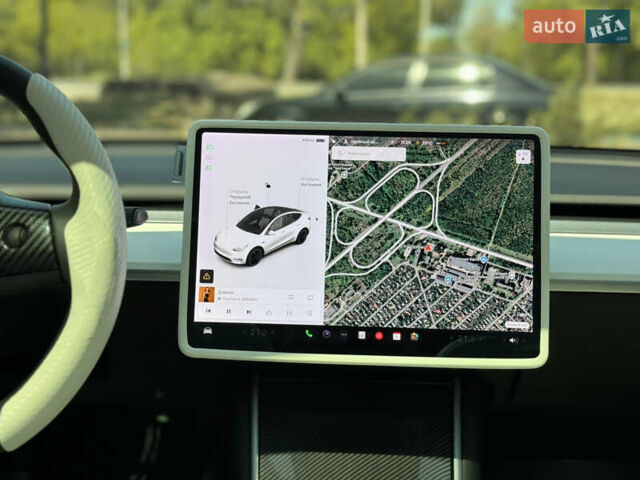 Белый Тесла Model Y, объемом двигателя 0 л и пробегом 84 тыс. км за 28000 $, фото 16 на Automoto.ua