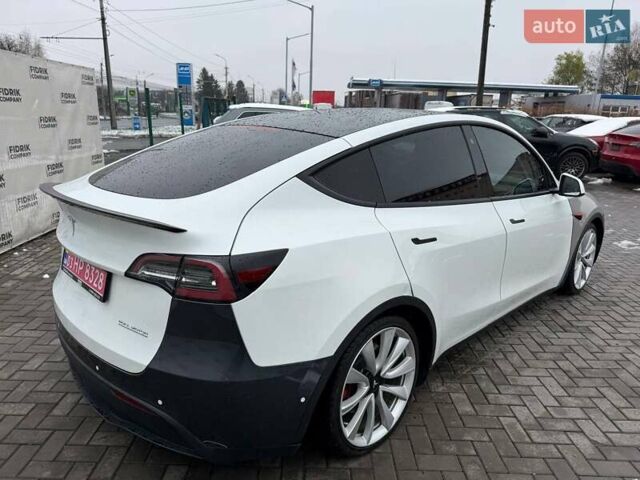Белый Тесла Model Y, объемом двигателя 0 л и пробегом 142 тыс. км за 18800 $, фото 3 на Automoto.ua
