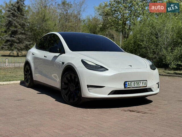 Белый Тесла Model Y, объемом двигателя 0 л и пробегом 84 тыс. км за 28000 $, фото 24 на Automoto.ua