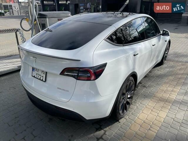Белый Тесла Model Y, объемом двигателя 0 л и пробегом 65 тыс. км за 32000 $, фото 2 на Automoto.ua